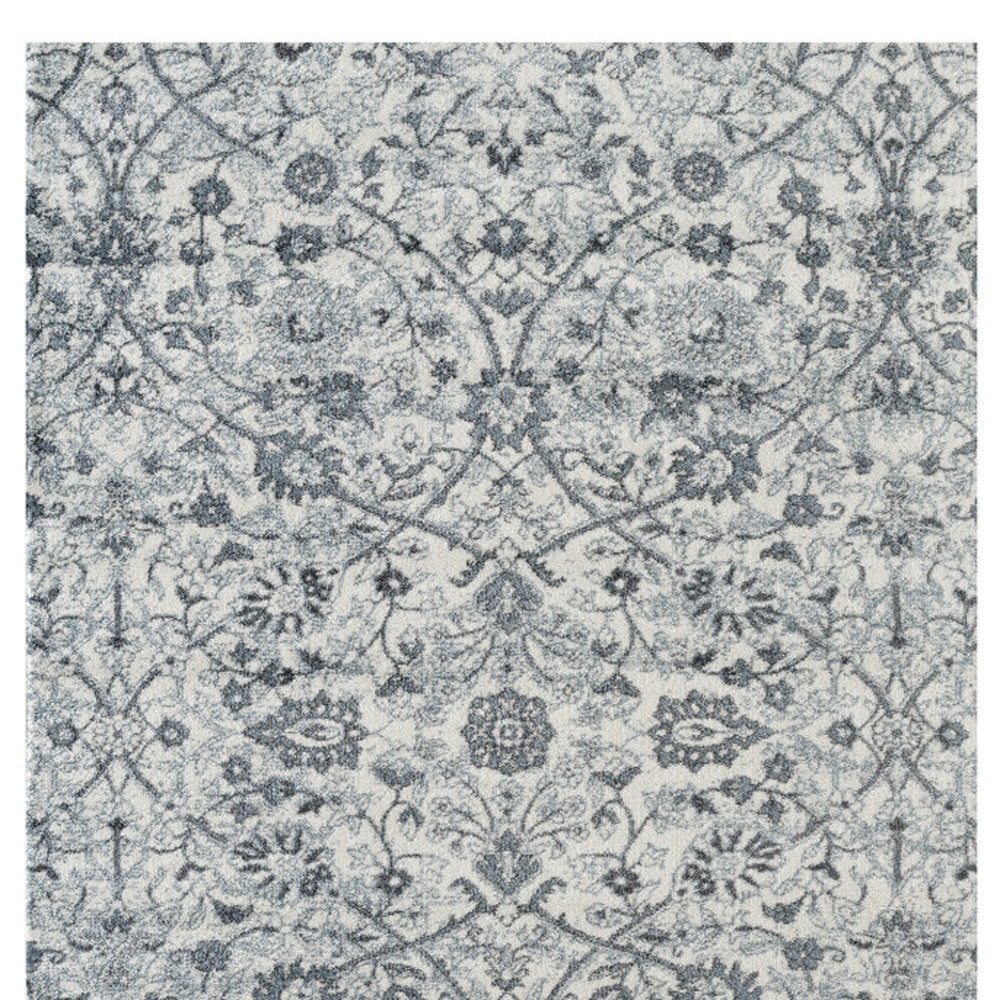 9' x 12' Gray and Beige Floral Power Loom Area Rug