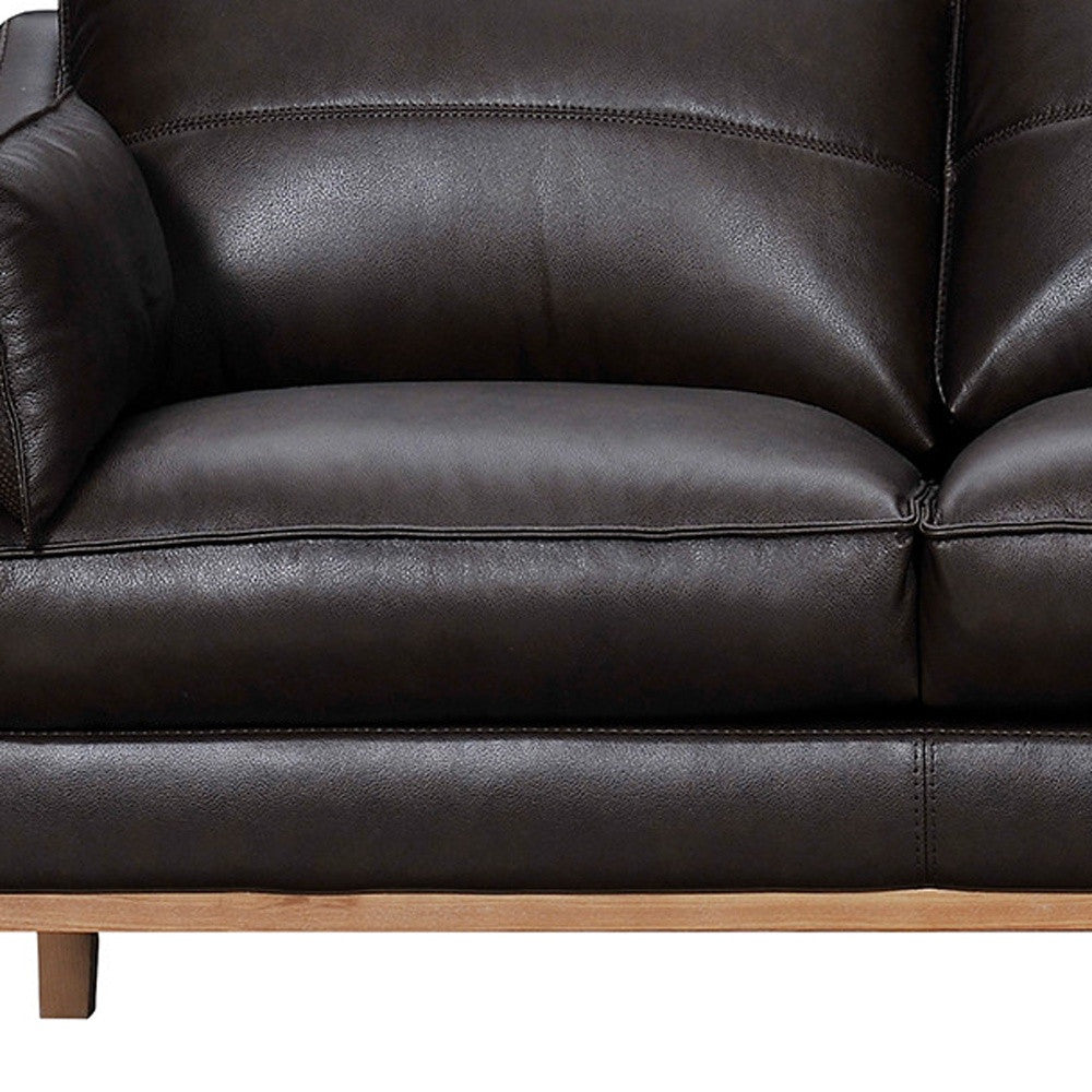 87" Dark Brown Leather Sofa And Toss Pillows